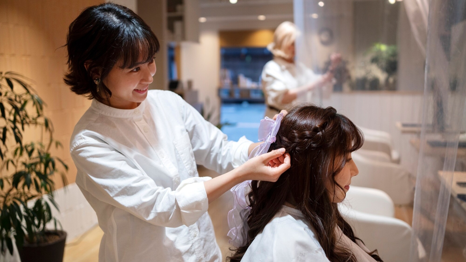 woman-getting-her-hair-done-japanese-hairdressers_23-2149395785